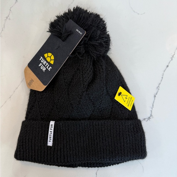 Turtle Fur Black Knit fleece lining and Pom-Pom Beanie adult size unisex
MWT - Picture 2 of 5